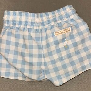 TBBC swim trunks.